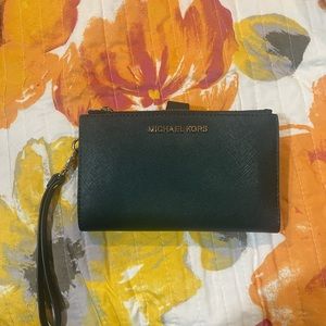 Green Michael Kors wristlet wallet